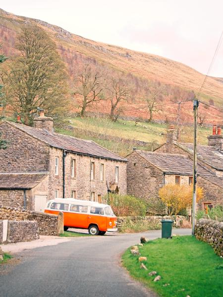 It's scenes like this that make me strongly consider getting a camper van. The way it pokes out from the row of houses, nestled in amongst the hills of the Yorkshire Dales.